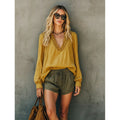 Shipped: new european and american style women's v-neck ruffle trim solid color long sleeve versatile blouse