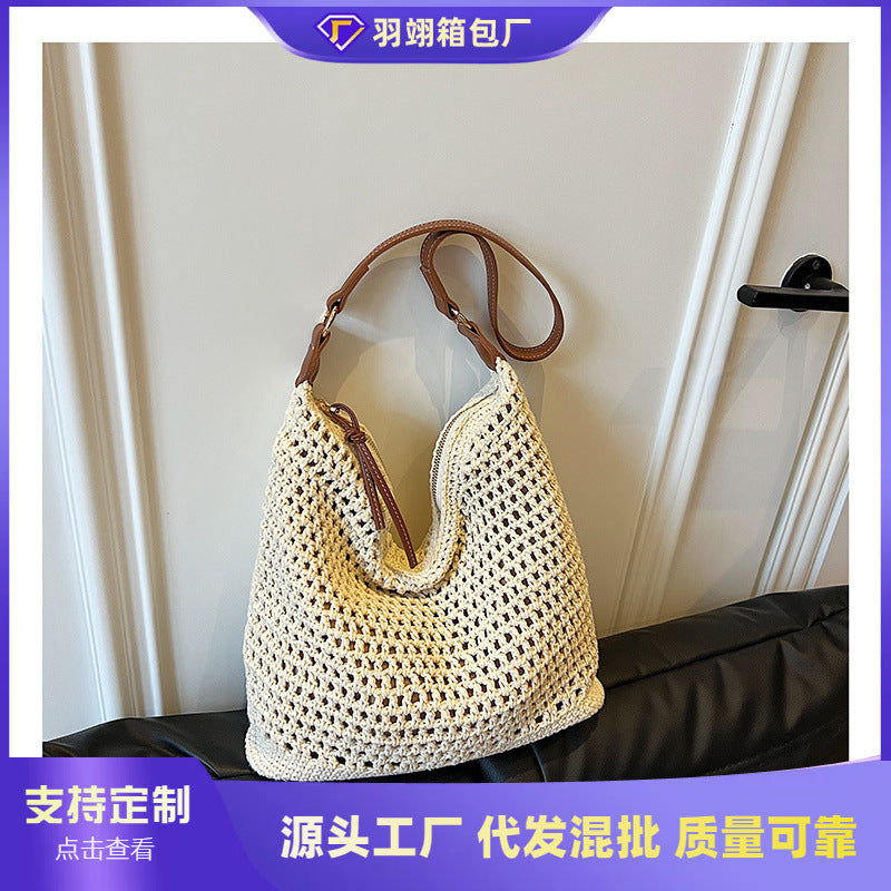 Cross-border trendy fashion hollow straw woven underarm bag women's 2025 summer simple temperament large capacity casual shoulder bag