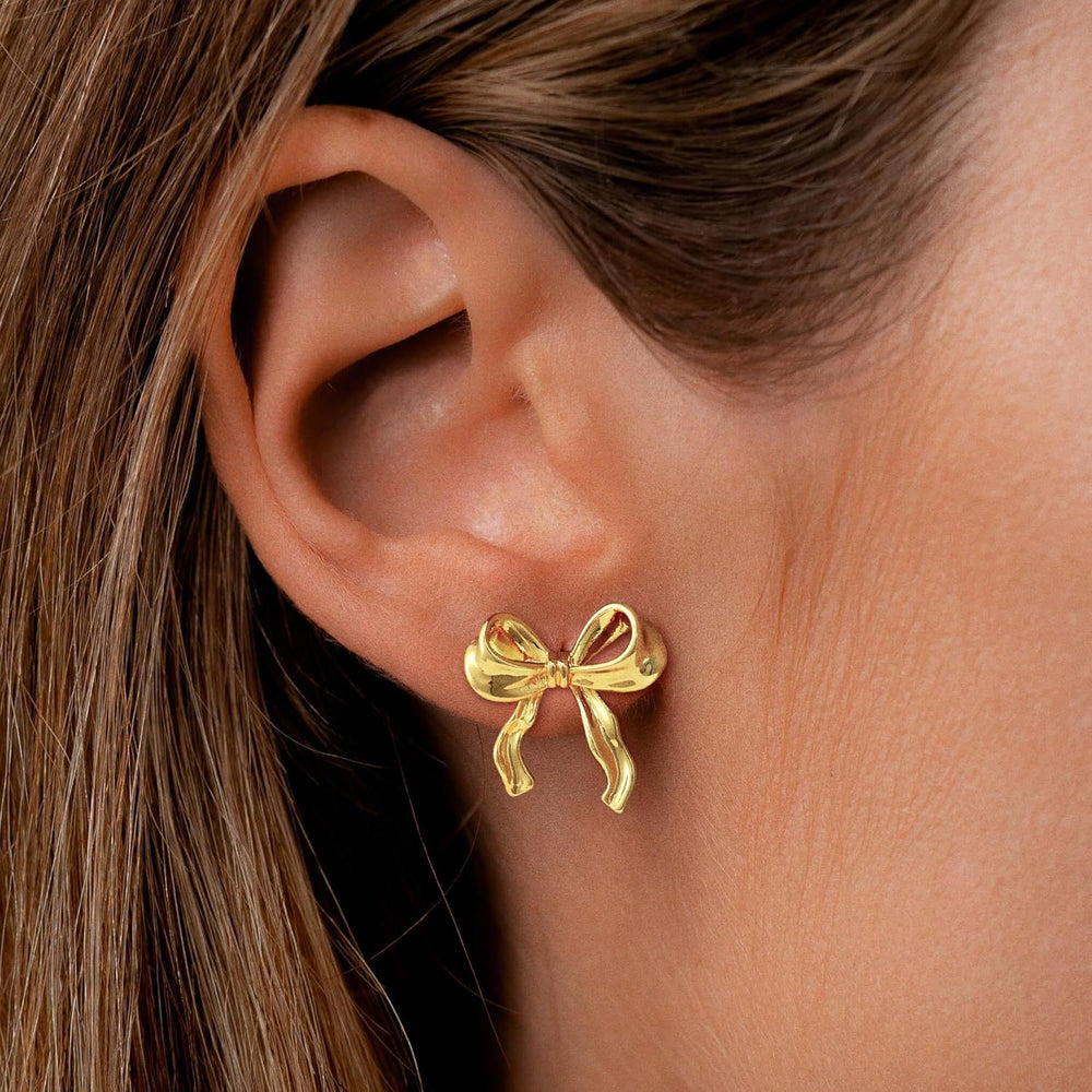 Amazon cross-border fashion light luxury gold-plated copper stud earrings, gold bow earrings, high-end women's jewelry wholesale