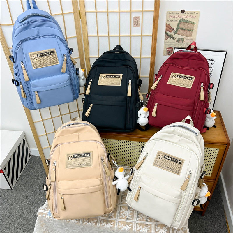 Cross-border wholesale large-capacity leisure backpack versatile burden reduction schoolbag outdoor handbag portable high school backpack