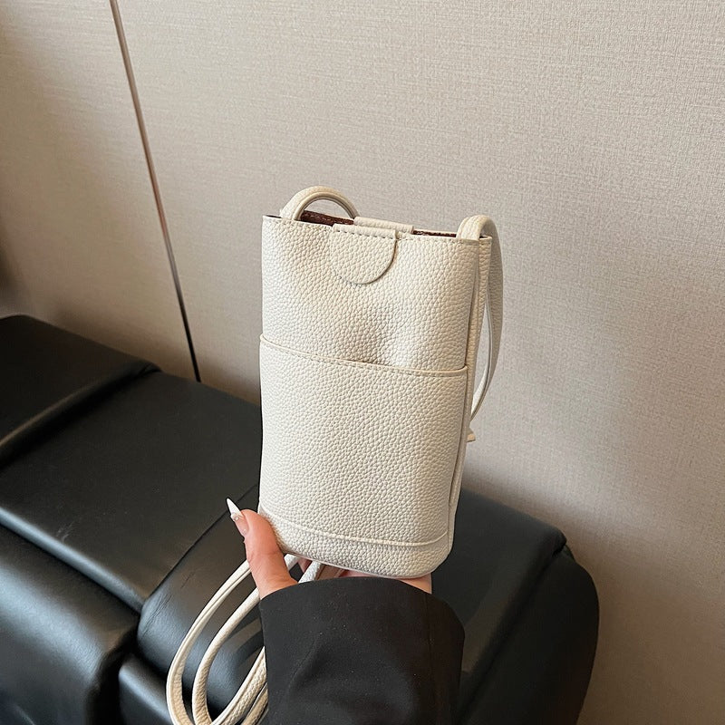 Small bag for  mobile phones Women's 2025 new fashion bucket bag Summer simple texture shoulder messenger bag