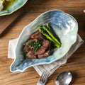 Japanese kiln-turned ceramic flavor dish stylish restaurant hotel oyster-shaped high-value dessert small dish dipping soy sauce dish