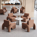One table and four chairs in coffee color