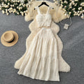 Age-reducing fresh spring and summer holiday style short small flying sleeve suspender tops + high waist pleated skirt two-piece set
