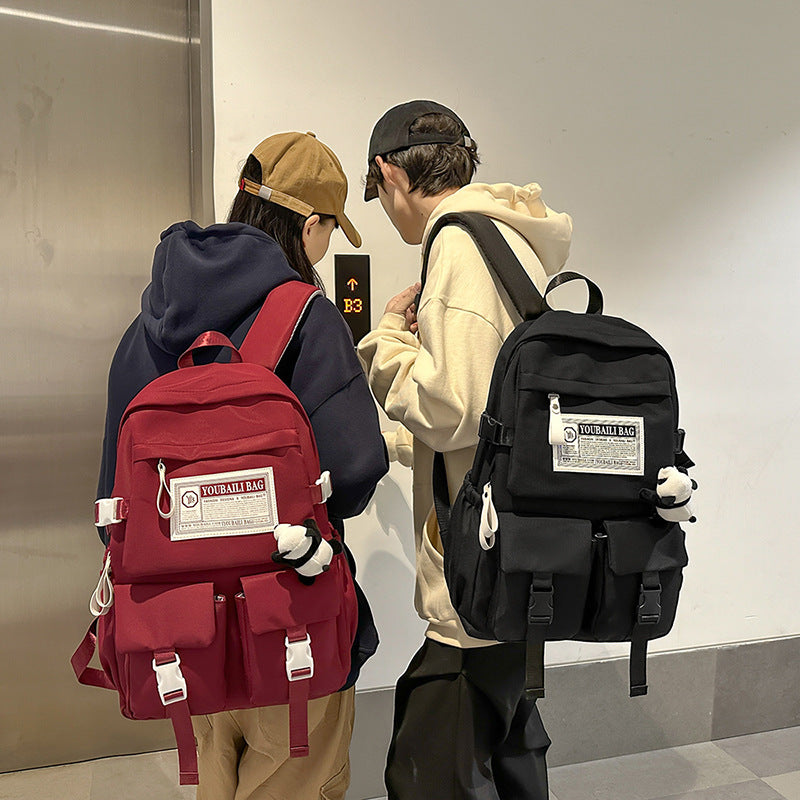 New travel backpack computer backpack casual solid color ultra-light junior high school students large-capacity schoolbag