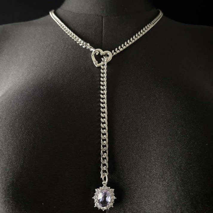 Women's heart-shaped slide chain necklace with detachable heart o-ring, gold cuban chain, and sparkling crystal pendant, adjustable
