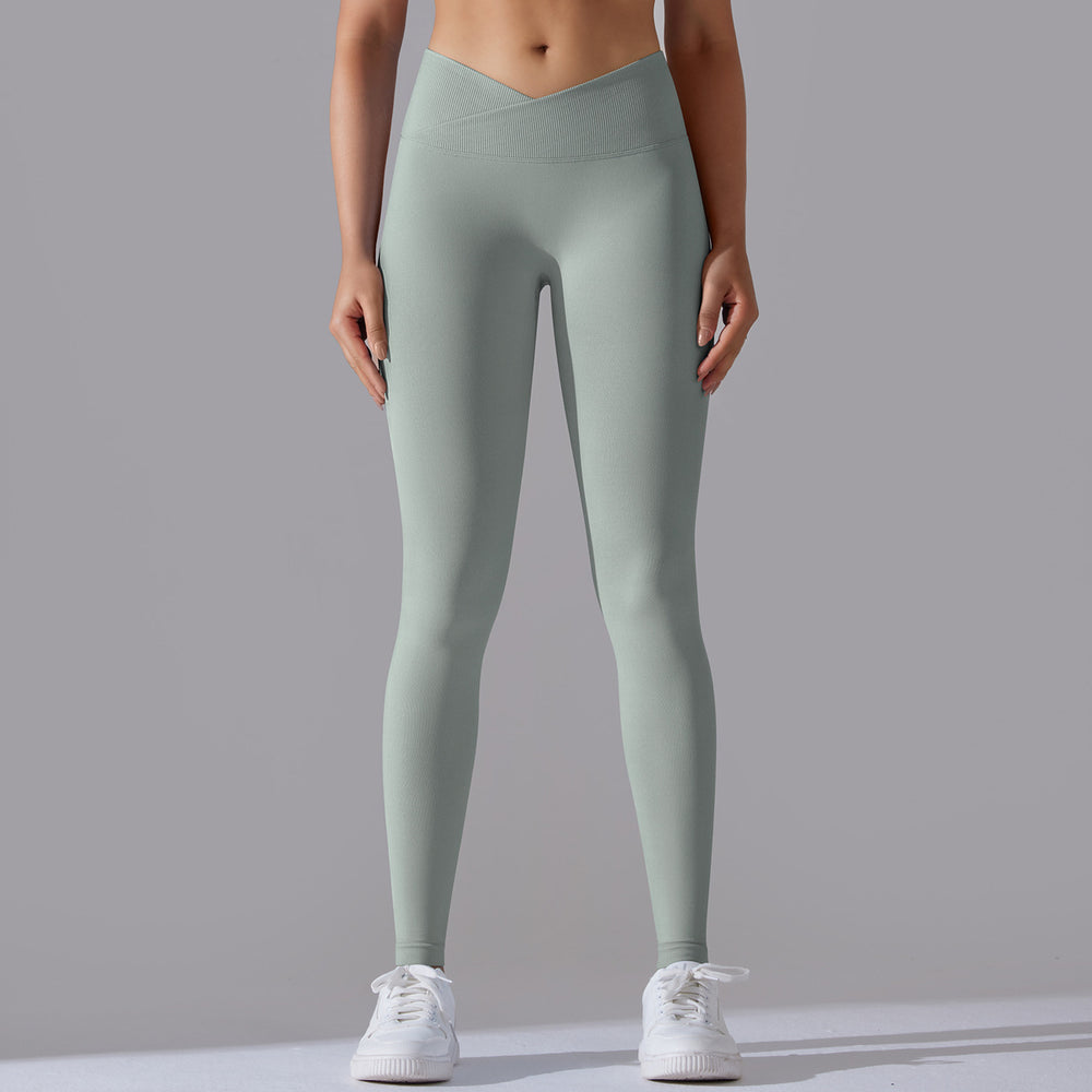 fashion seamless knitting breathable pure color cross waist peach hip yoga pants running fitness nine-point pants women