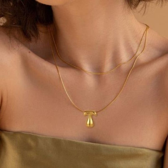 Amazon bestseller: premium bubble 26-letter gold pearlized necklace pendant - stylish women's accessory