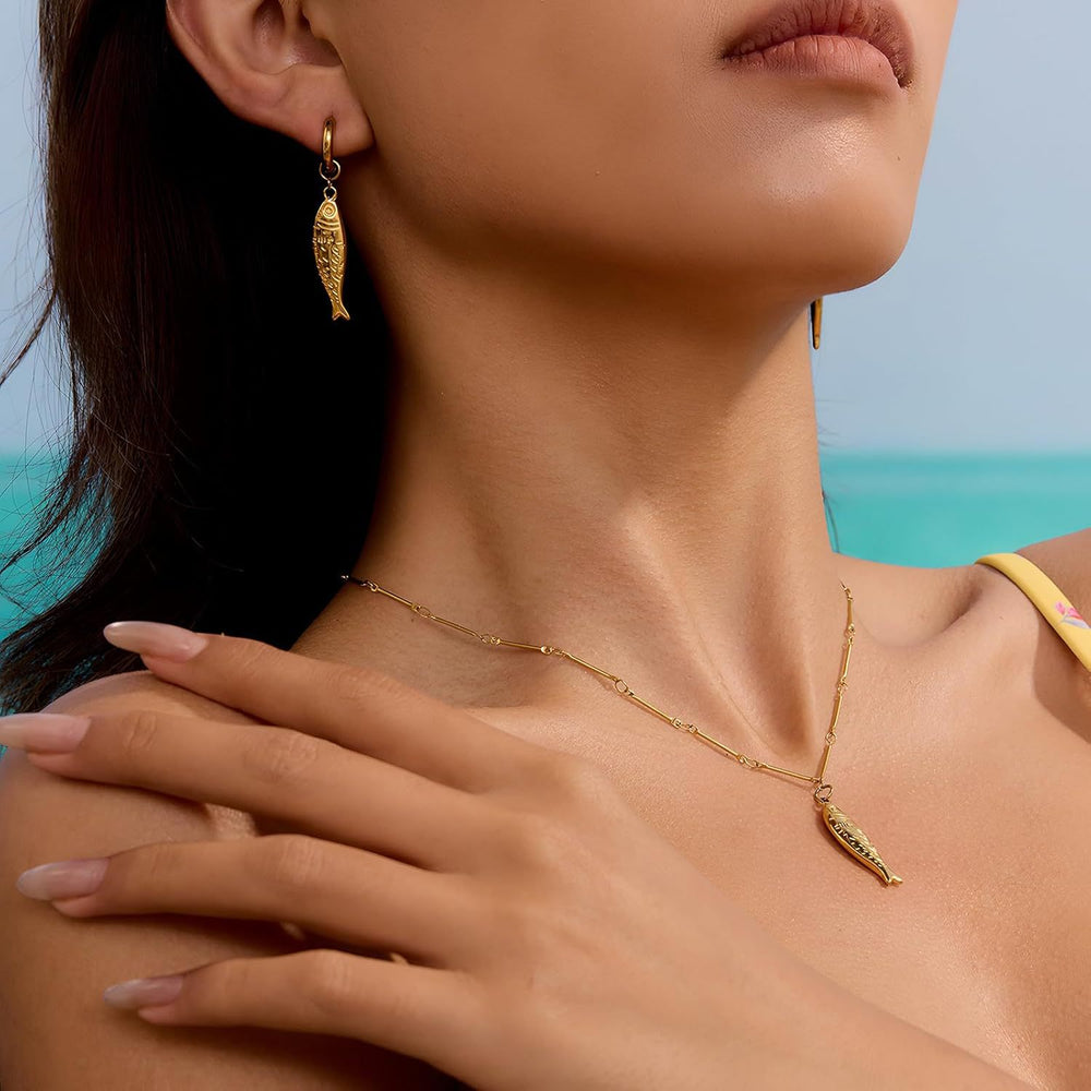 European and american stylish stainless steel beach fish 8k gold pendant necklace fish element titanium steel ocean wind earrings in stock