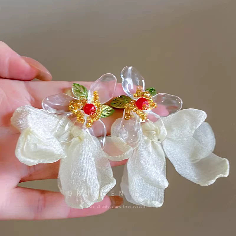 Vacation-ready, ethereal yellow floral earrings for women - new 2026 collection. perfect for beach getaways, these unique and bold statement earrings are sure to turn heads