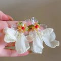 Vacation-ready, ethereal yellow floral earrings for women - new 2026 collection. perfect for beach getaways, these unique and bold statement earrings are sure to turn heads