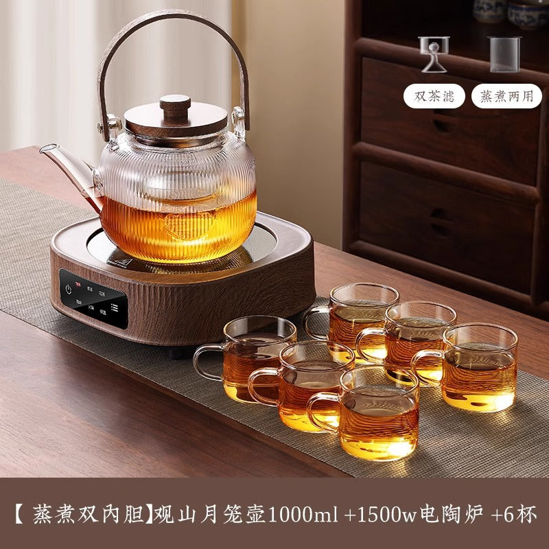 A complete set of wood grain electric ceramic stoves for making tea around the stove, a set of glass teapots for making tea around the stove, and an electric stove