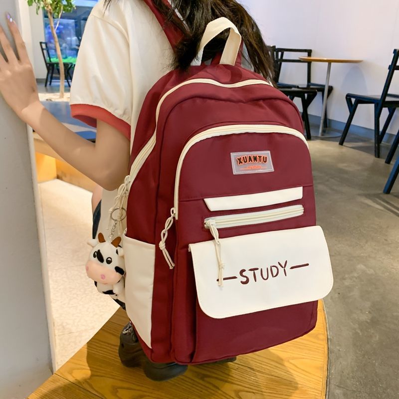 School bag wholesale children's high school junior high school primary school students grades one, two, three to six ultra-light weight reduction backpack women's multi-capacity