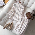 elegant vertical striped commute set: notch lapel blazer with cinched waist, paired with high-waisted, drapey wide-leg trousers for women