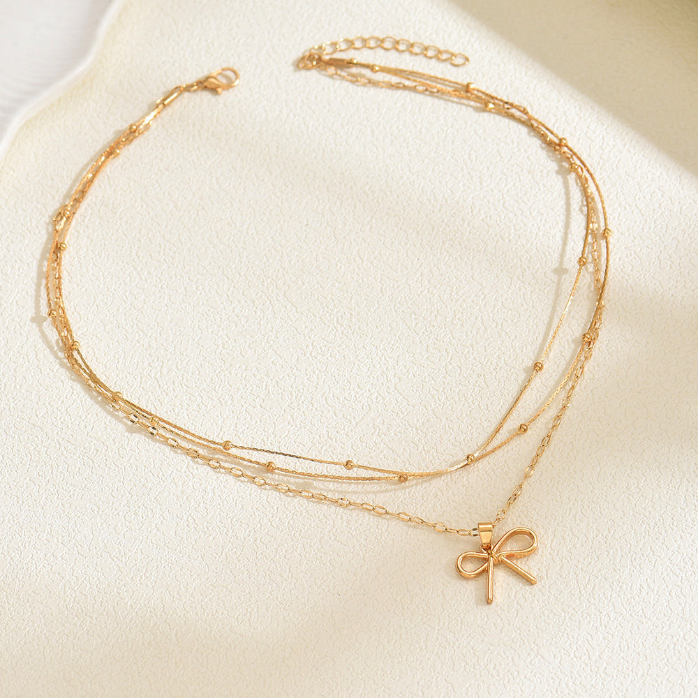 European and american cross-border fashion minimalist alloy bow pendant necklace, light luxury small multi-layered beaded chain necklace