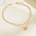 European and american cross-border fashion minimalist alloy bow pendant necklace, light luxury small multi-layered beaded chain necklace