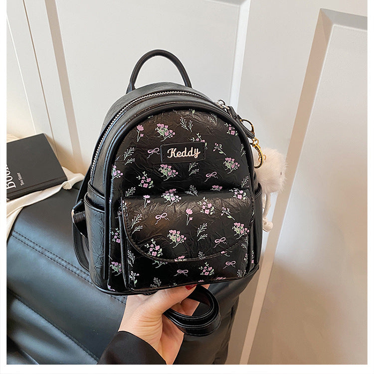 Cross-border backpack women's fashion versatile niche design Korean version student schoolbag casual texture lightweight travel backpack