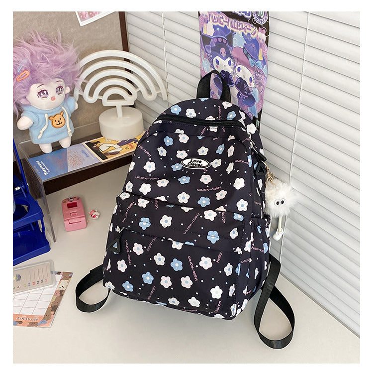 Niche original floral design schoolbag high value large capacity lightweight versatile backpack travel attendance backpack