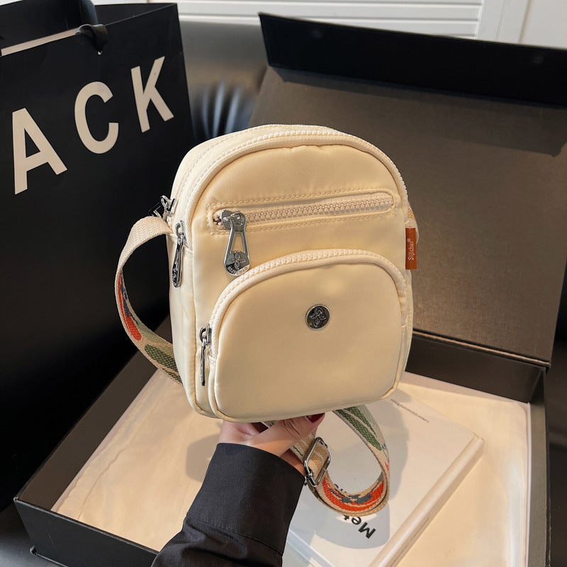 Foreign trade lightweight small cloth bag women's 2025 new summer fashion lightweight small satchel mobile phone bag multi-layer messenger bag