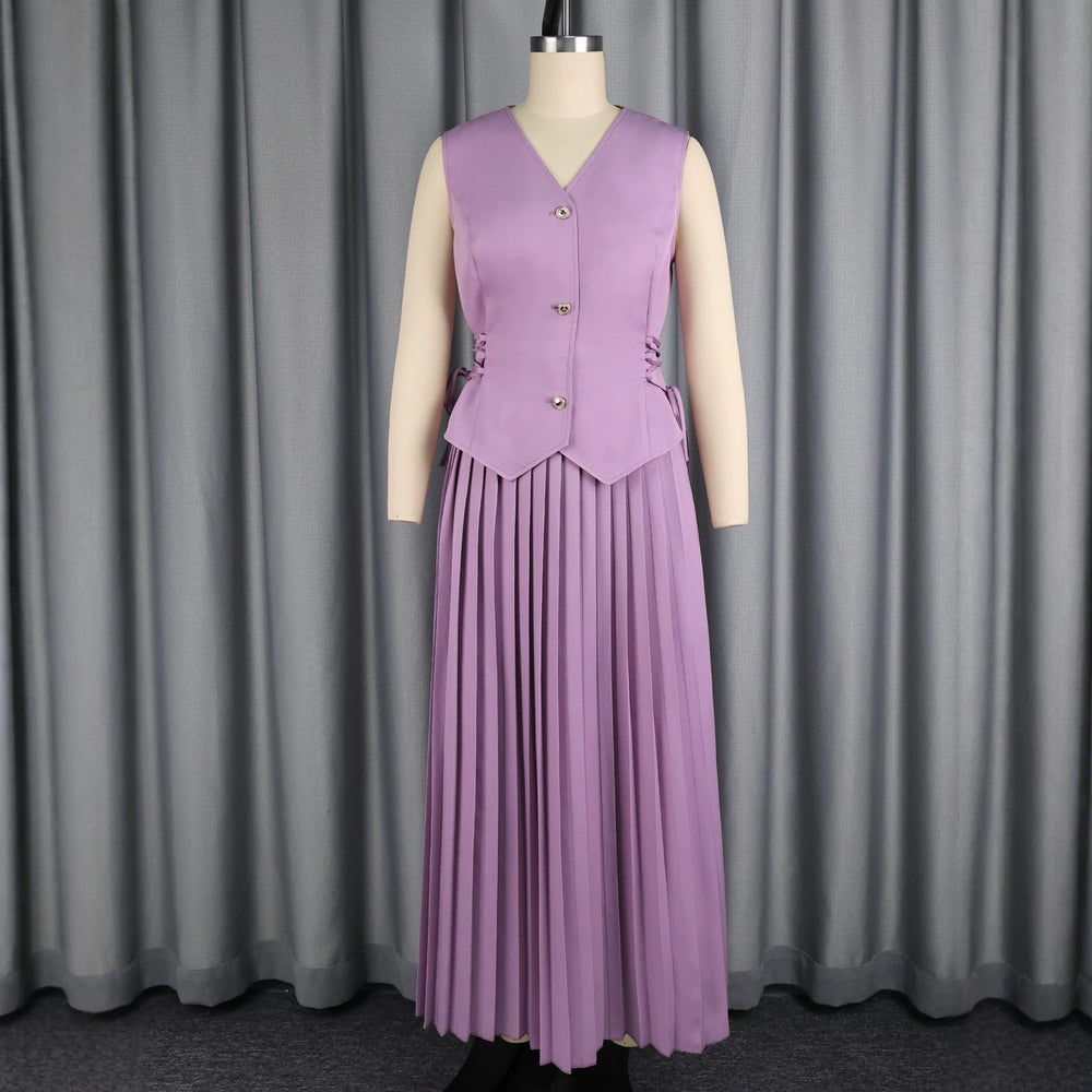 New solid color versatile set: high-waisted pleated slim-fit waist-cinching sleeveless drawstring top and a-line midi skirt two-piece outfit