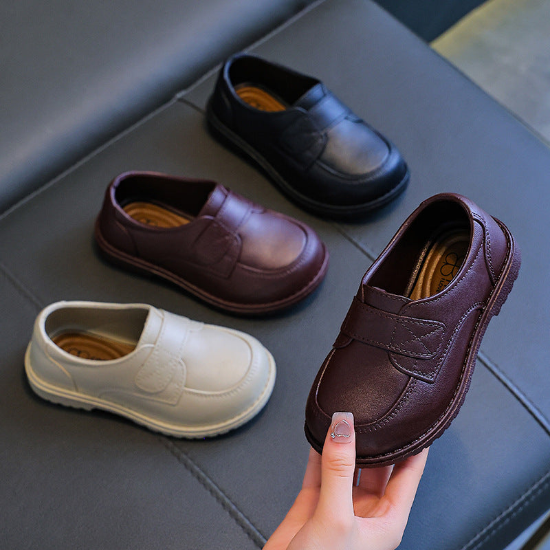 Kids' soft-soled single shoes - perfect for school, performances, and a british-inspired look. ideal for spring, these black leather shoes for boys add a touch of style to any outfit