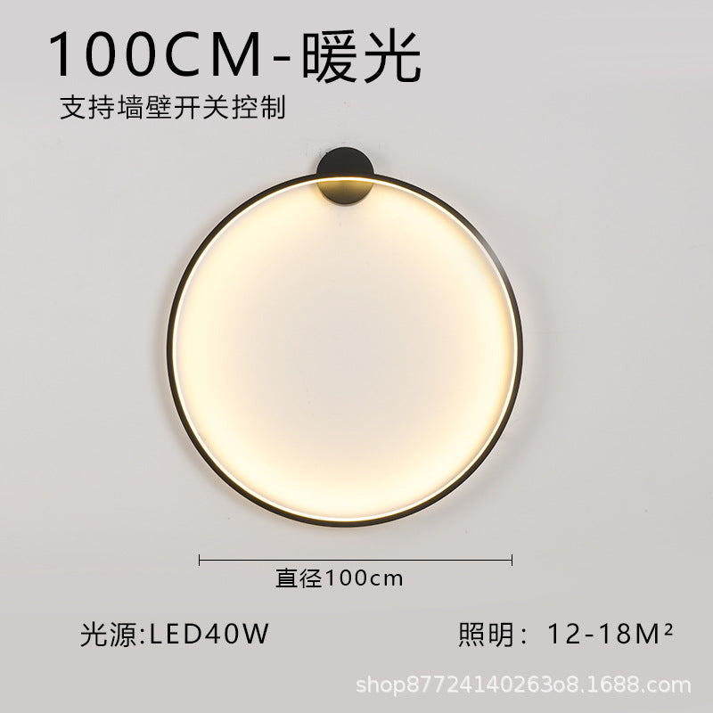 Minimalist chic large round wall sconce - stylish ambient lighting for living room backdrops, bedroom headboards, and more