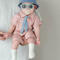 Baby short-sleeve romper: adorable summer outfit for little boys - stylish and trendy for summer strolls and crawling!