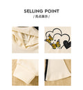 Girls' autumn outfit: beige hooded sweatshirt with cartoon print and bow detail, paired with flared pants