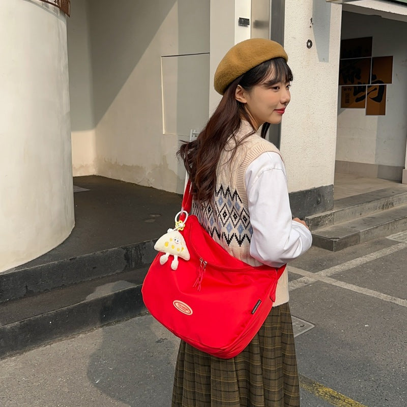 Foreign single nylon cloth bag women's large capacity 2025 new summer versatile shoulder messenger bag casual commuter dumpling bag
