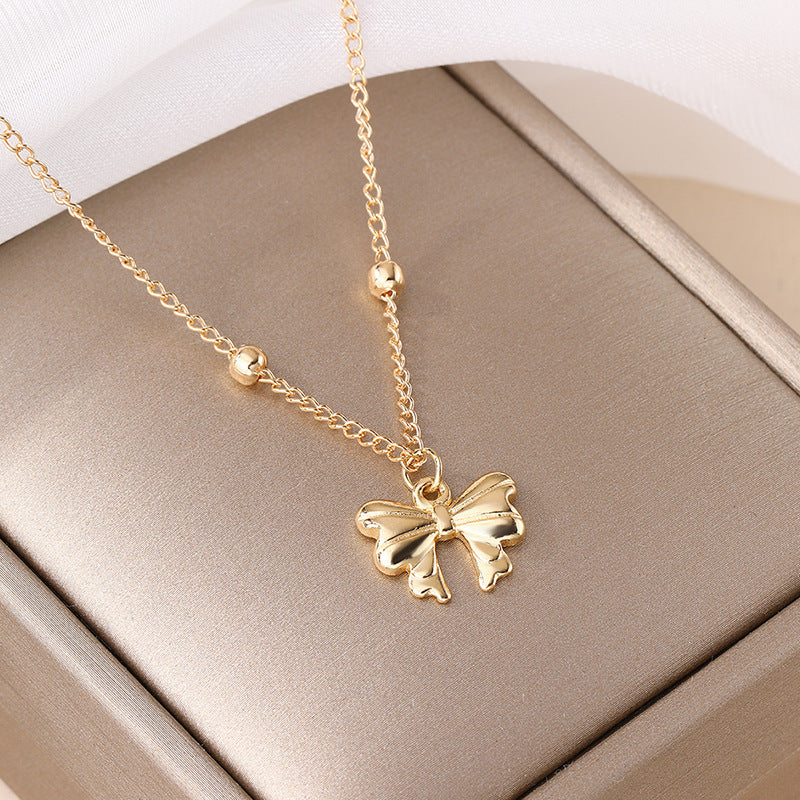 Wholesale bowknot necklaces - new european and american cross-border jewelry, niche light luxury necklaces, simple and versatile alloy pendants for women