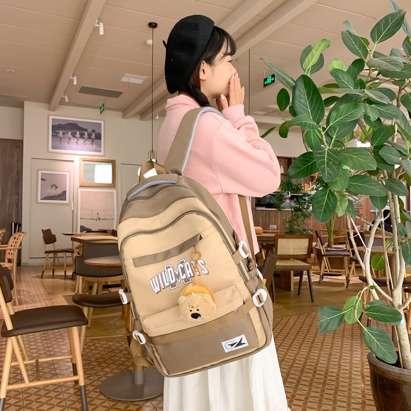 School bag, male college student, Korean version, junior high school student, high school, large-capacity burden reduction backpack, female middle school student, casual backpack.