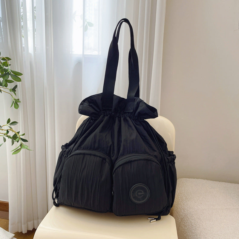 Cross-border college style high-value large-capacity backpack women's 2025 new niche pleated drawstring shoulder bag