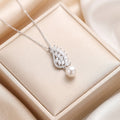 8442 pearl and diamond feather steel necklace