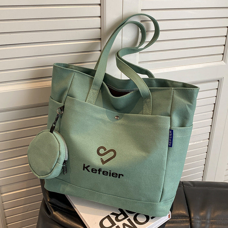 Canvas bag, women's large-capacity 2023 new high-end shoulder bag, college student class versatile commuter tote bag