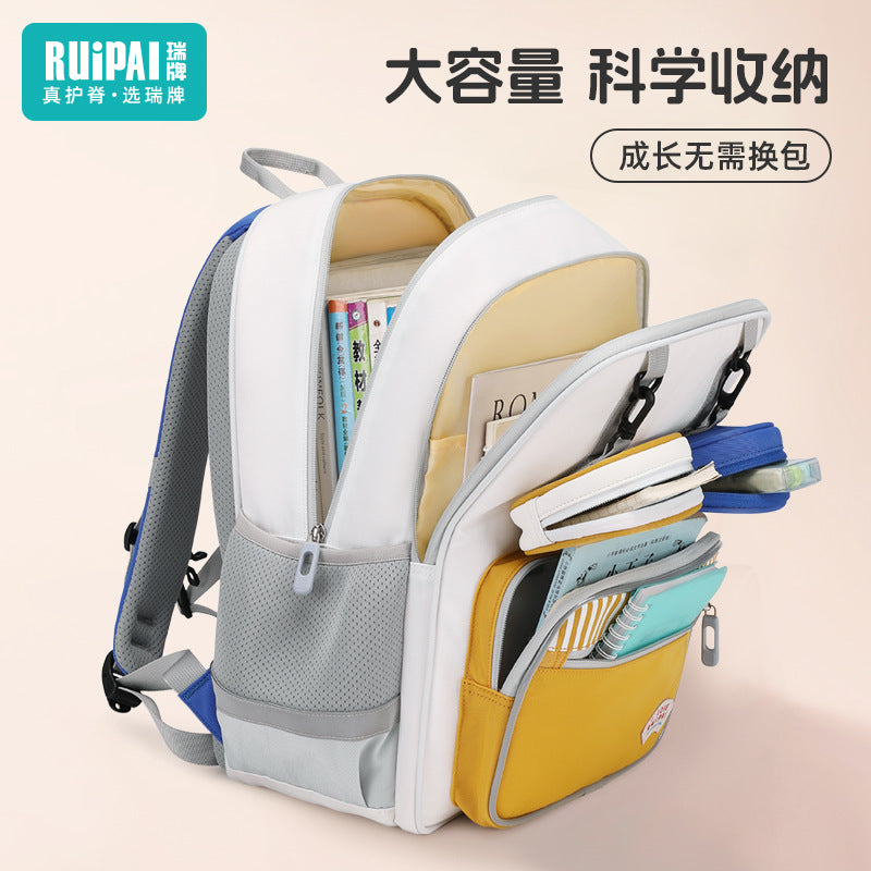 Rui brand children's schoolbag primary school students first and second grade boys and girls spine care to reduce the burden of children's lightweight waterproof backpack