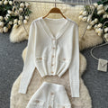 Xiaoxiangfengclassyfashionv neck metal button knittingcardigantops women's high waistslimming look skirt two-piece set