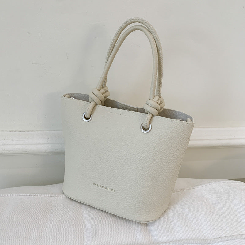 Cross-border high-end lychee pattern bucket bag women's 2025 new portable vegetable basket bag fashionable shoulder messenger bag