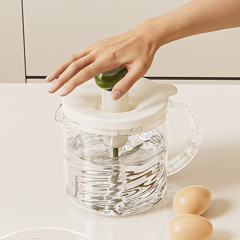 Multifunctional hand mixer with built-in whisk, press-down filter, and egg beater – perfect for cream whipping and baking
