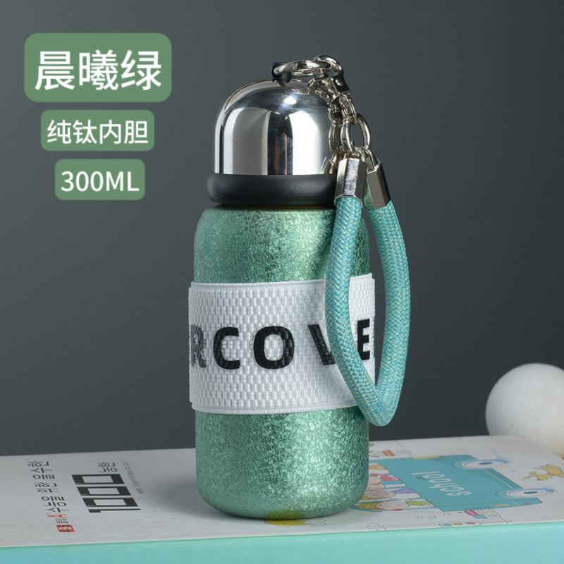 Titanium-plated thermos cup, titanium-plated high-end light luxury portable water cup, ladies' high-looking double-layer flap pocket pants cup, mini titanium gift box