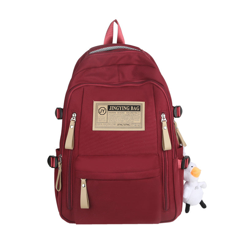 Cross-border wholesale large-capacity leisure backpack versatile burden reduction schoolbag outdoor handbag portable high school backpack