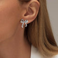 Amazon cross-border fashion light luxury gold-plated copper stud earrings, gold bow earrings, high-end women's jewelry wholesale