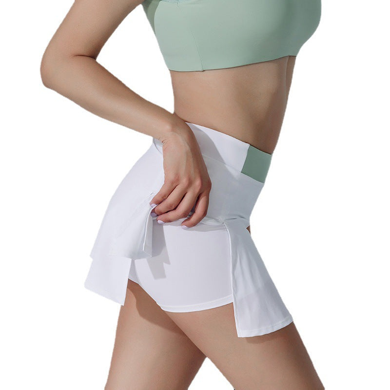 Ready-to-ship green athletic tennis skirt, european and american style solid color running fitness split skirt, quick-dry tennis skort with skirt hem