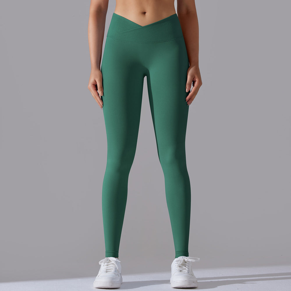 fashion seamless knitting breathable pure color cross waist peach hip yoga pants running fitness nine-point pants women