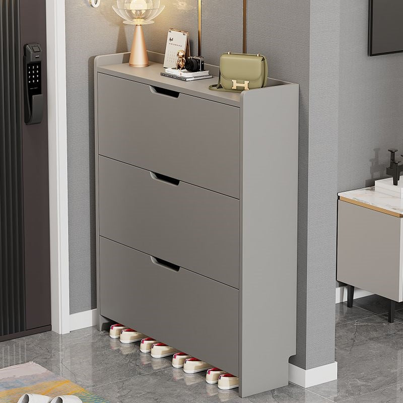 Ultra-thin flip-top shoe cabinet, modern minimalist design, perfect for small apartments. entryway console with concealed handles, multi-layered dustproof storage shoe rack