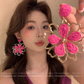 Vacation style braided sunflower earrings for women, high-end seaside photo flowers earrings, fashionelegant earrings and earrings