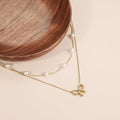 European and american cross-border new multi-layer choker necklace for women, simple and elegant bowknot faux pearl pendant necklace gift