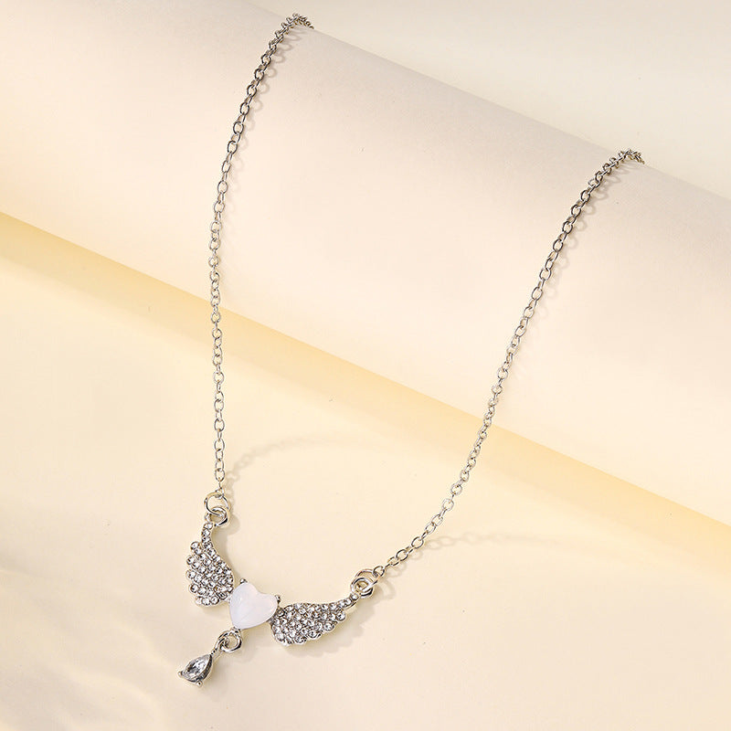 New arrival cross-border jewelry european and american diamond-encrusted acrylic pendant simple and versatile alloy angel wings necklace for women