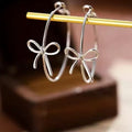 Exaggerated elegant bows earrings women's niche design unique earrings square and round face show face small big earrings earrings