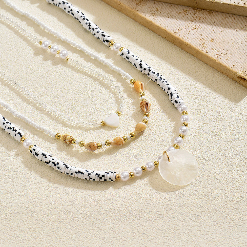 Wholesale seashell beaded necklaces - european & american style, cross-border e-commerce, sweater accessories for women, layered necklaces, unique heart & pearl clavicle chains