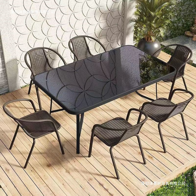 Outdoor table and chair set with umbrella, sunshade, perfect for outdoor cafes, bubble tea shops, and casual outdoor seating. features a wrought iron frame and rattan chairs, ideal for patios and gardens